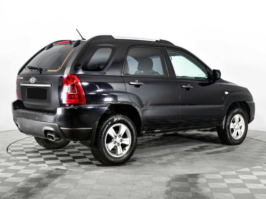 Kia Sportage с пробегом — 2010 год. Фото: #4