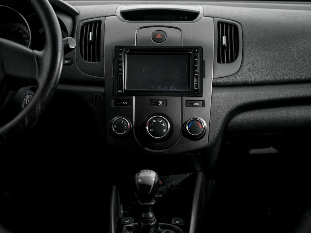 Kia Cerato с пробегом — 2010 год. Фото: #11