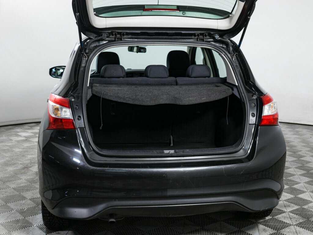 Nissan Tiida с пробегом — 2015 год. Фото: #6