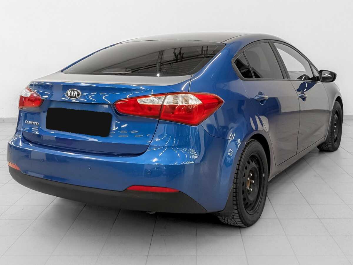 Kia Cerato с пробегом — 2013 год. Фото: #4