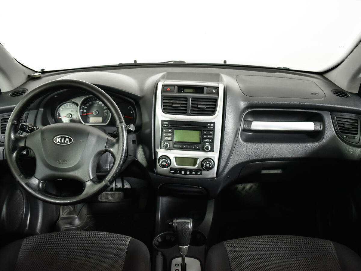 Kia Sportage с пробегом — 2010 год. Фото: #10