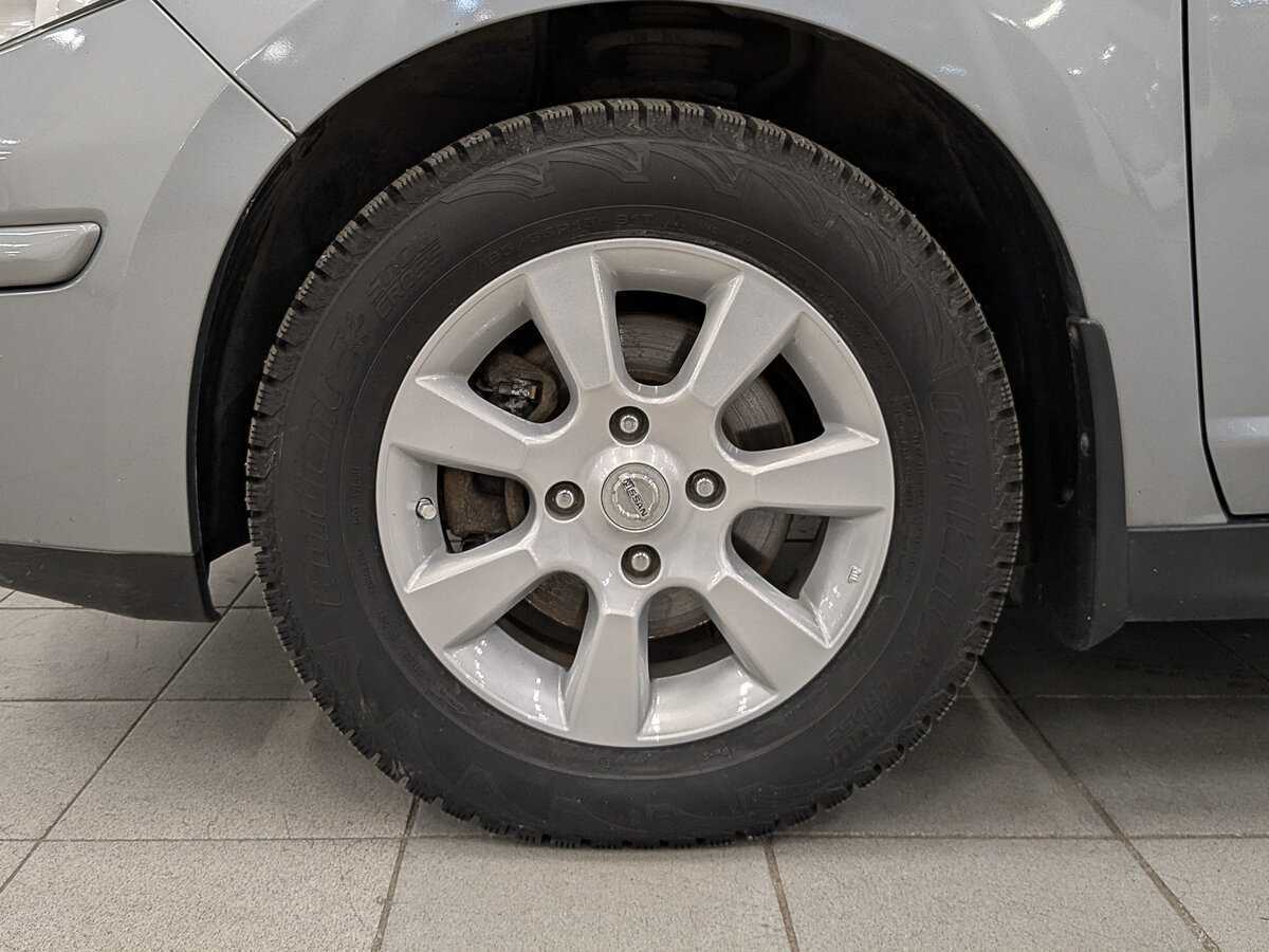 Nissan Tiida с пробегом — 2008 год. Фото: #11