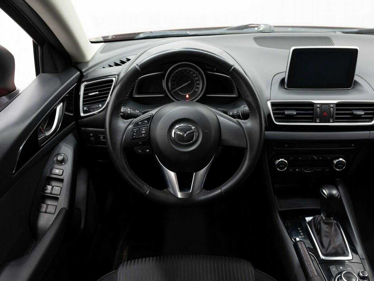 Mazda 3 с пробегом — 2014 год. Фото: #13