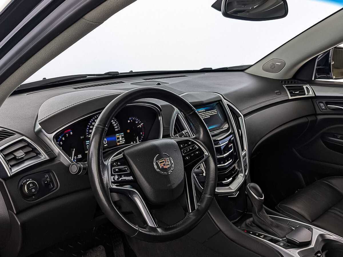 Cadillac SRX с пробегом — 2015 год. Фото: #14