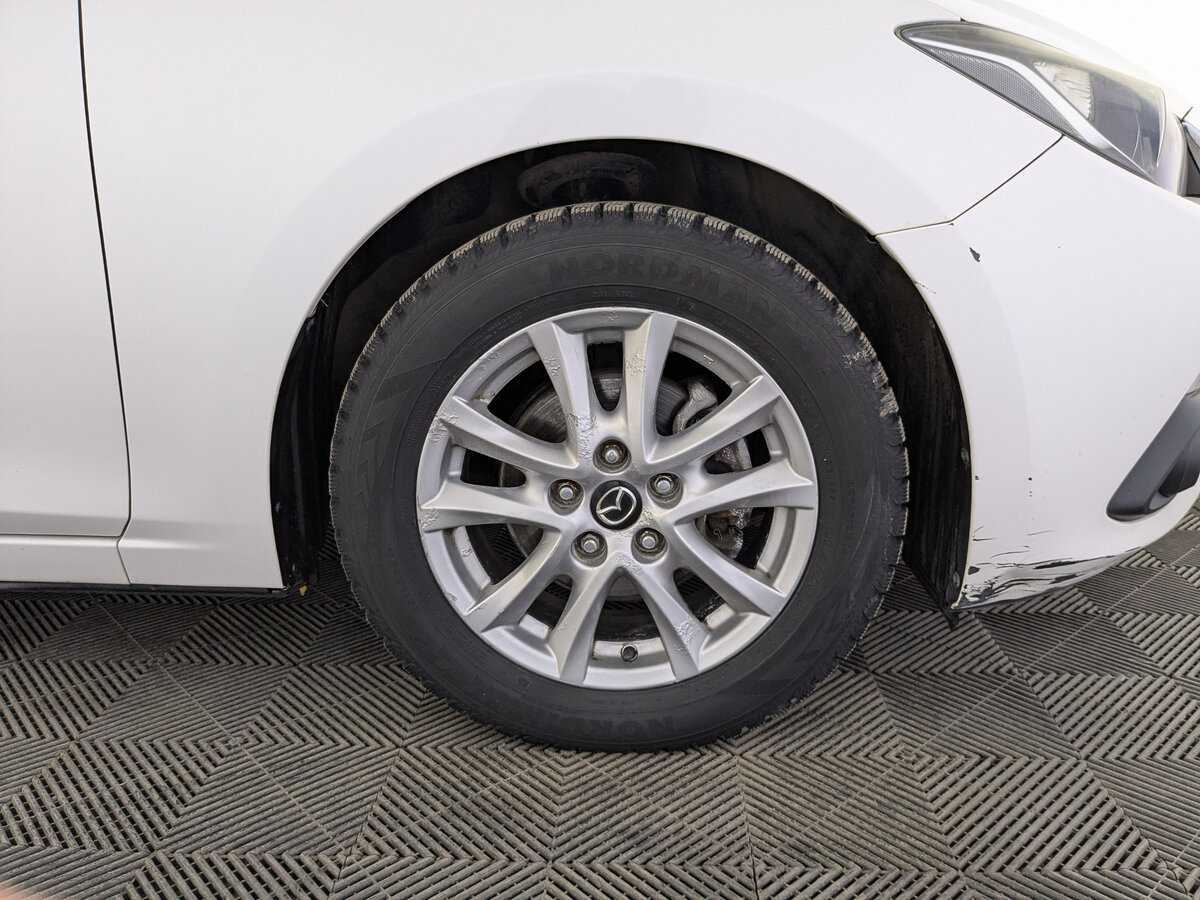 Mazda 3 с пробегом — 2014 год. Фото: #11