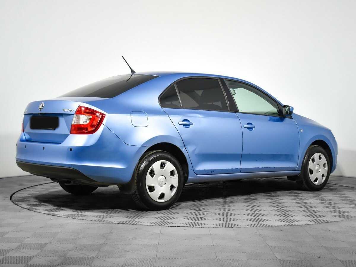 Skoda Rapid с пробегом — 2014 год. Фото: #4