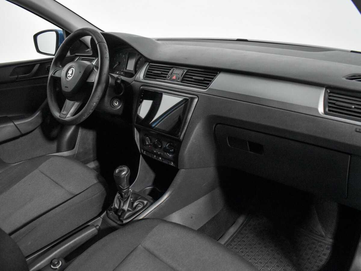 Skoda Rapid с пробегом — 2014 год. Фото: #13