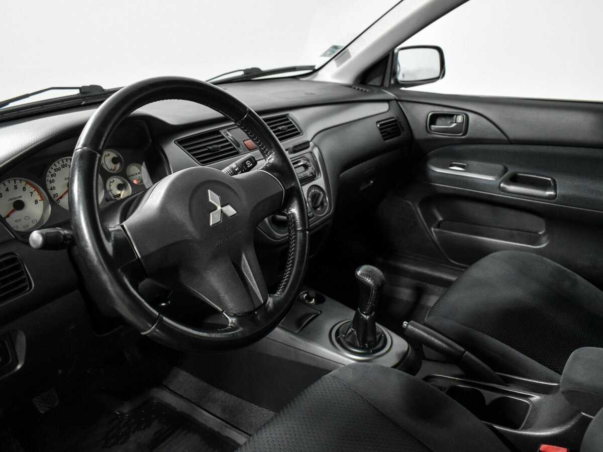 Mitsubishi Lancer с пробегом — 2006 год. Фото: #5