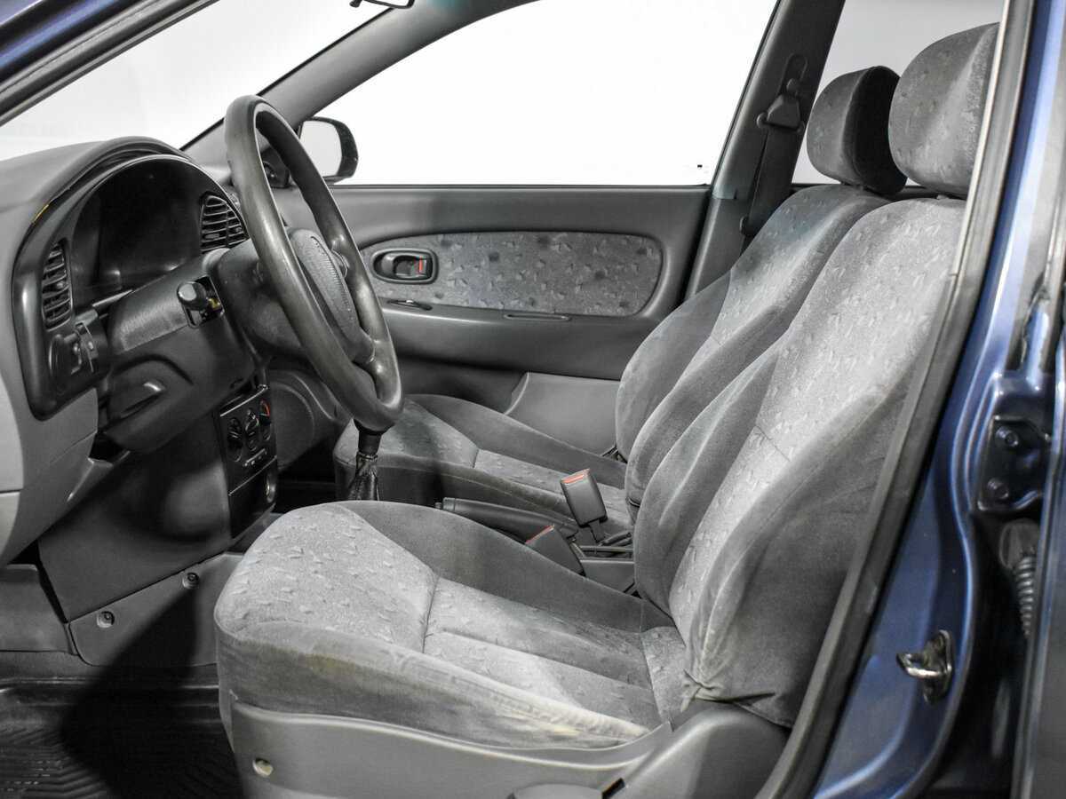 Kia Spectra с пробегом — 2004 год. Фото: #9