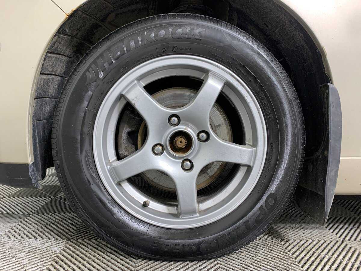 Nissan Tiida с пробегом — 2010 год. Фото: #9