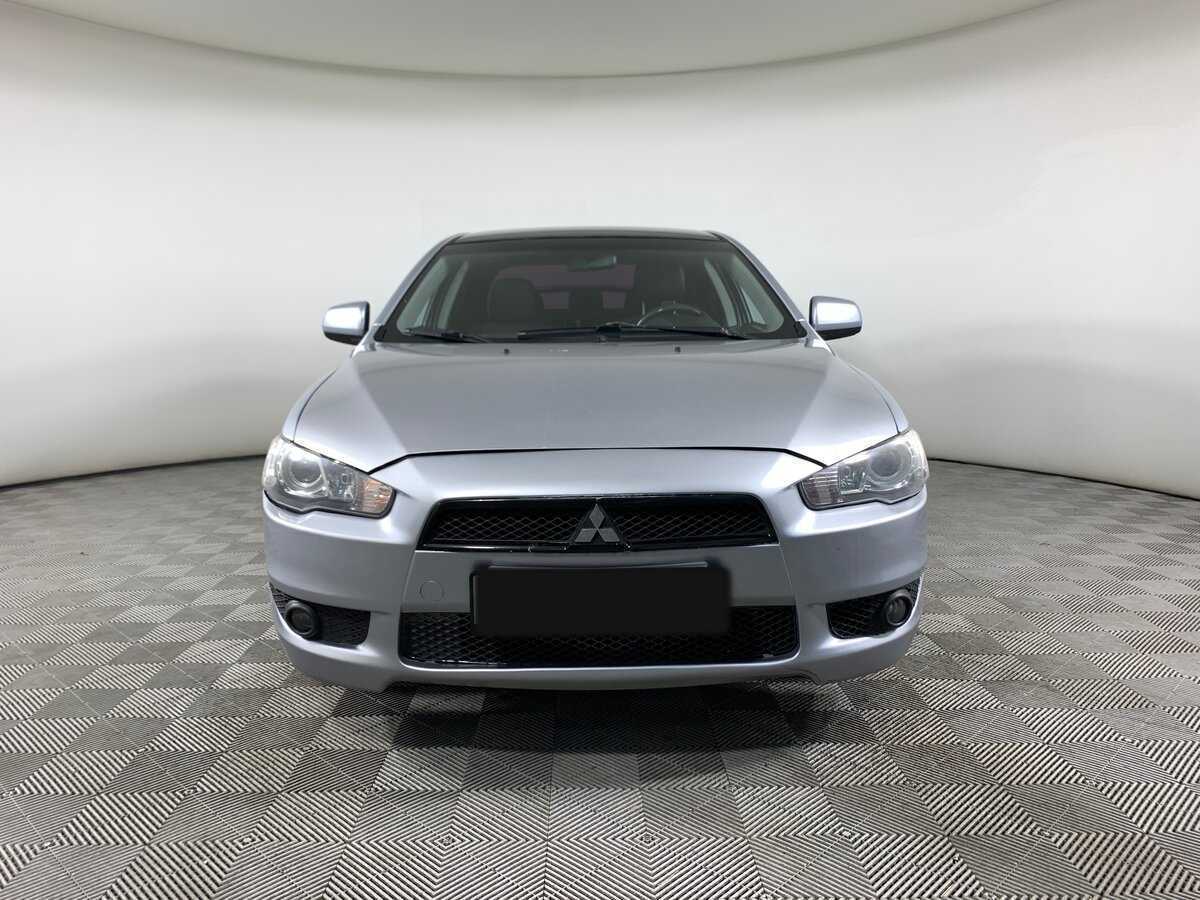 Mitsubishi Lancer с пробегом — 2009 год. Фото: #1