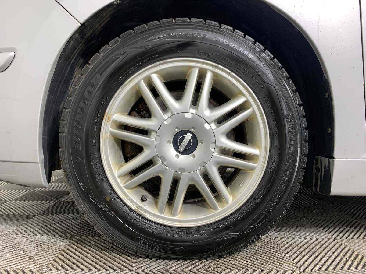 Nissan Tiida с пробегом — 2011 год. Фото: #8