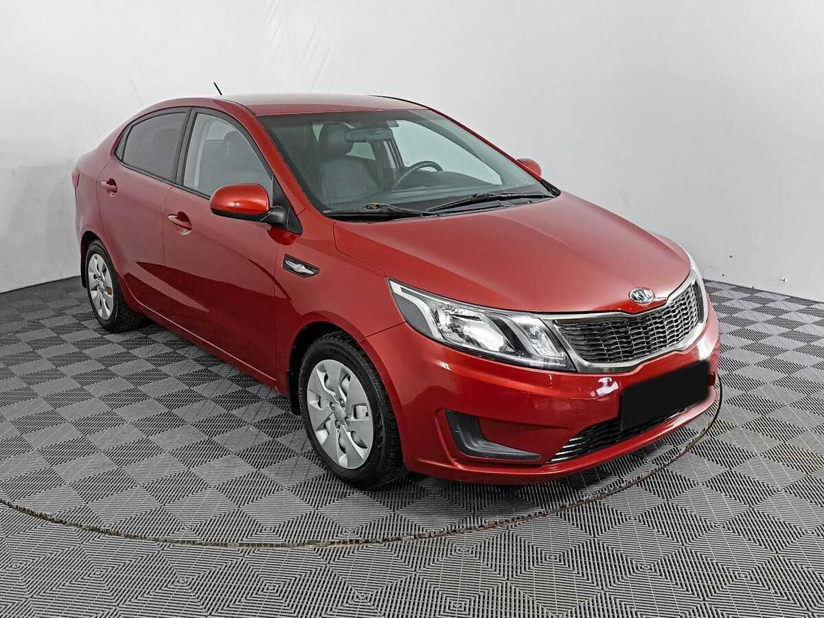Kia Rio с пробегом — 2011 год. Фото: #2