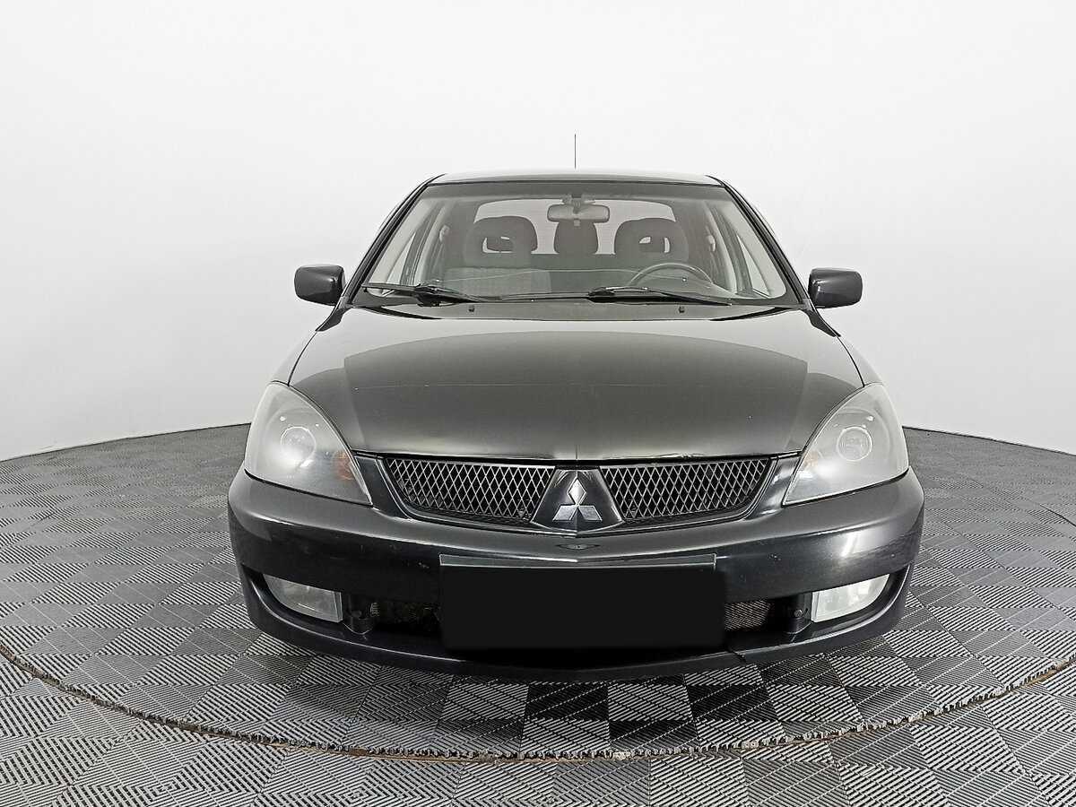 Mitsubishi Lancer с пробегом — 2009 год. Фото: #1