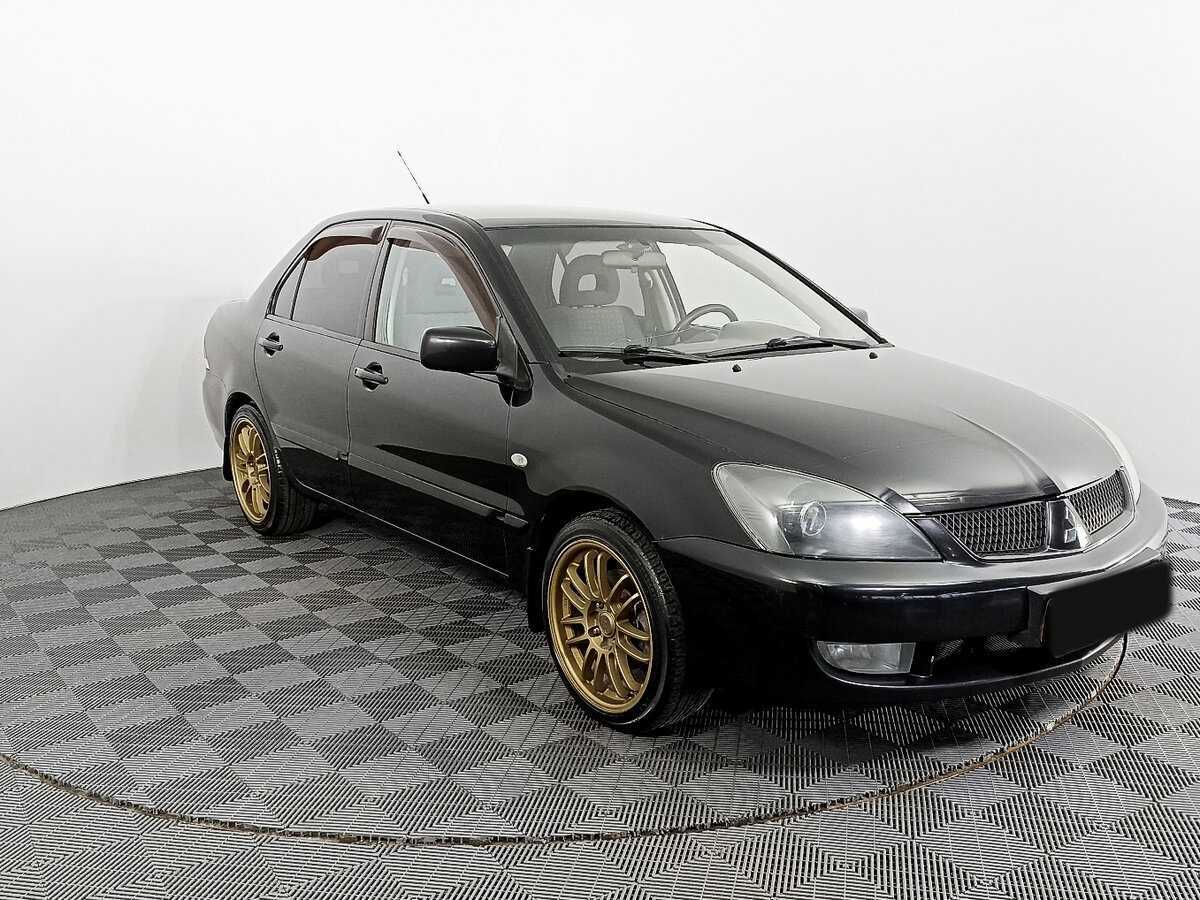 Mitsubishi Lancer с пробегом — 2009 год. Фото: #2