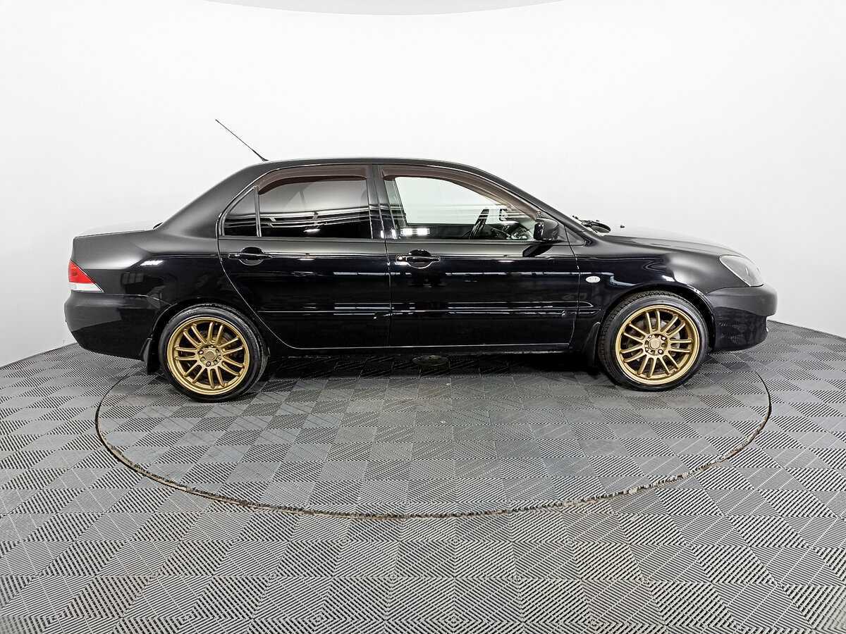 Mitsubishi Lancer с пробегом — 2009 год. Фото: #3