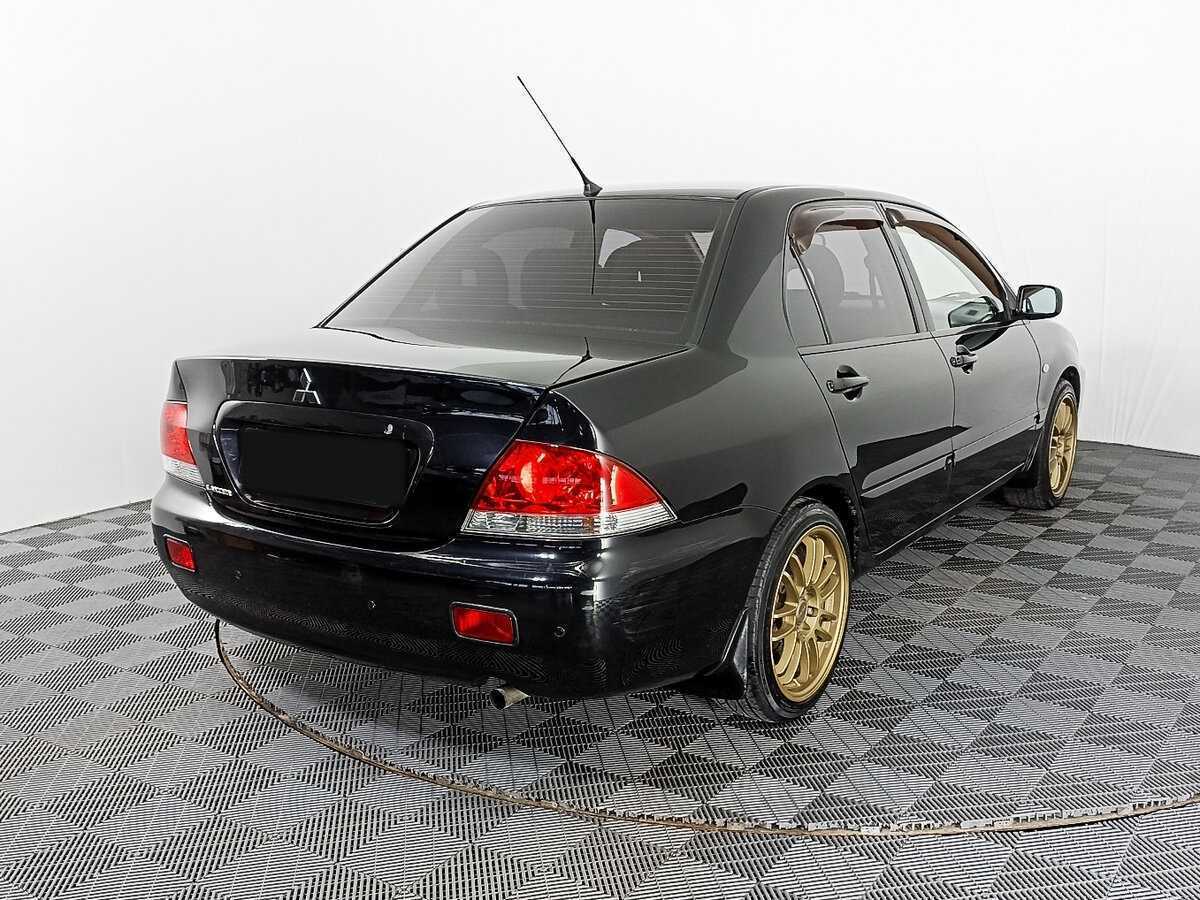 Mitsubishi Lancer с пробегом — 2009 год. Фото: #4