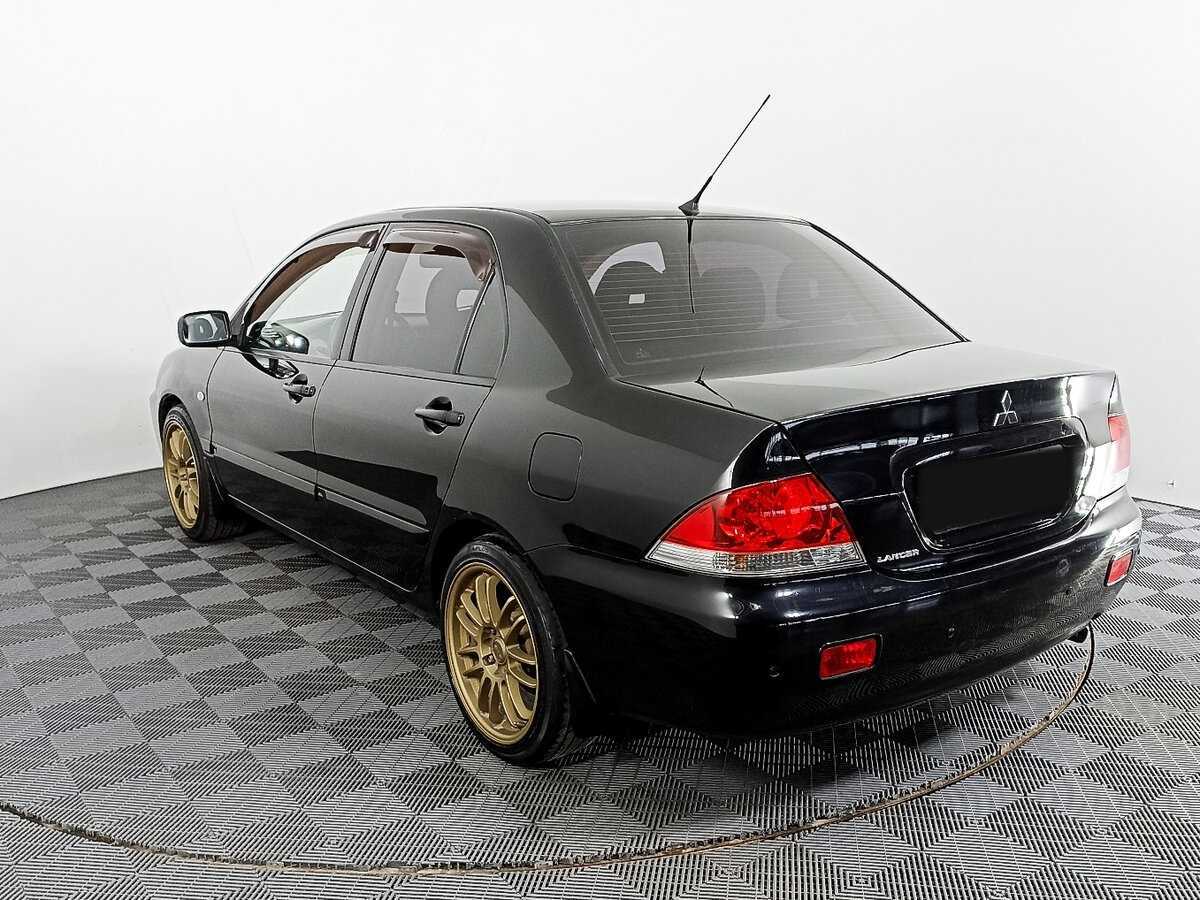 Mitsubishi Lancer с пробегом — 2009 год. Фото: #6