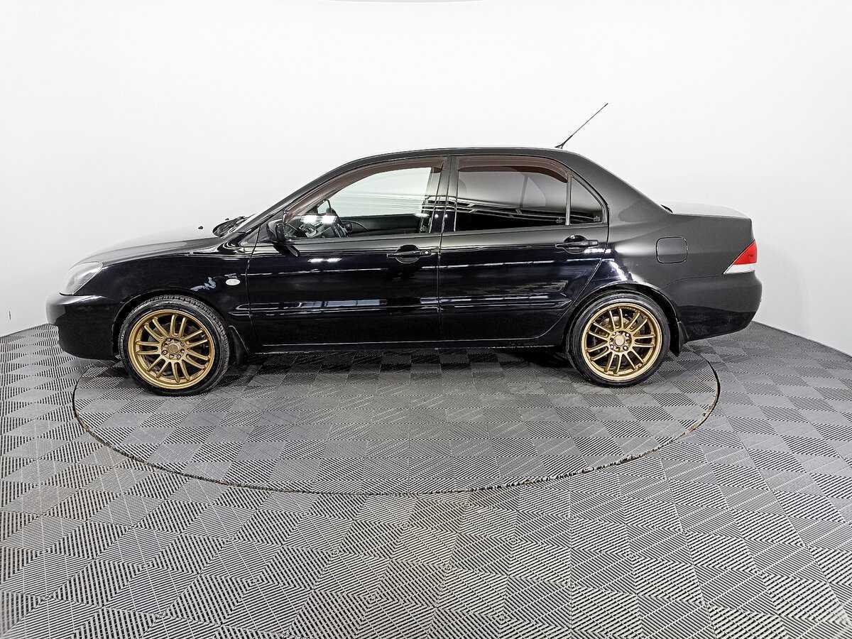 Mitsubishi Lancer с пробегом — 2009 год. Фото: #7