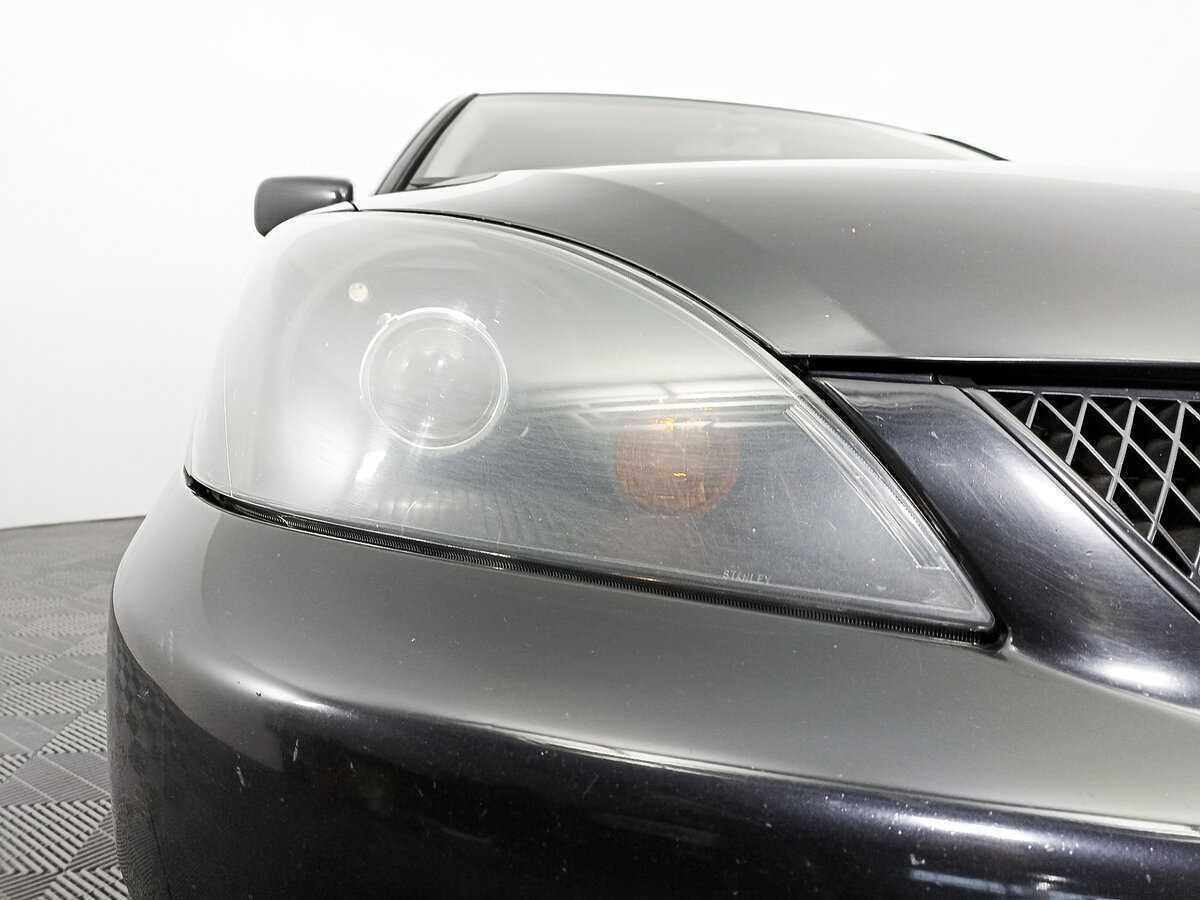 Mitsubishi Lancer с пробегом — 2009 год. Фото: #16