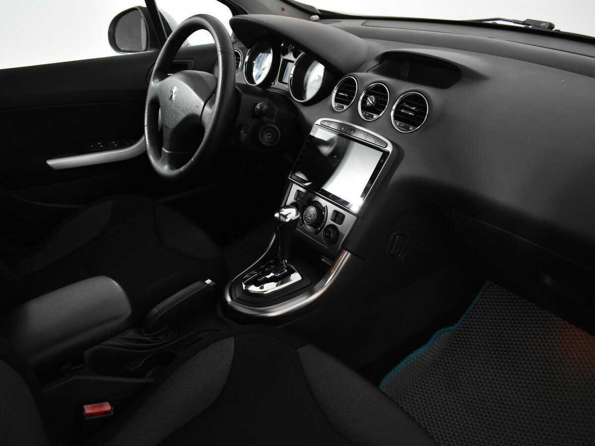 Peugeot 308 с пробегом — 2009 год. Фото: #9