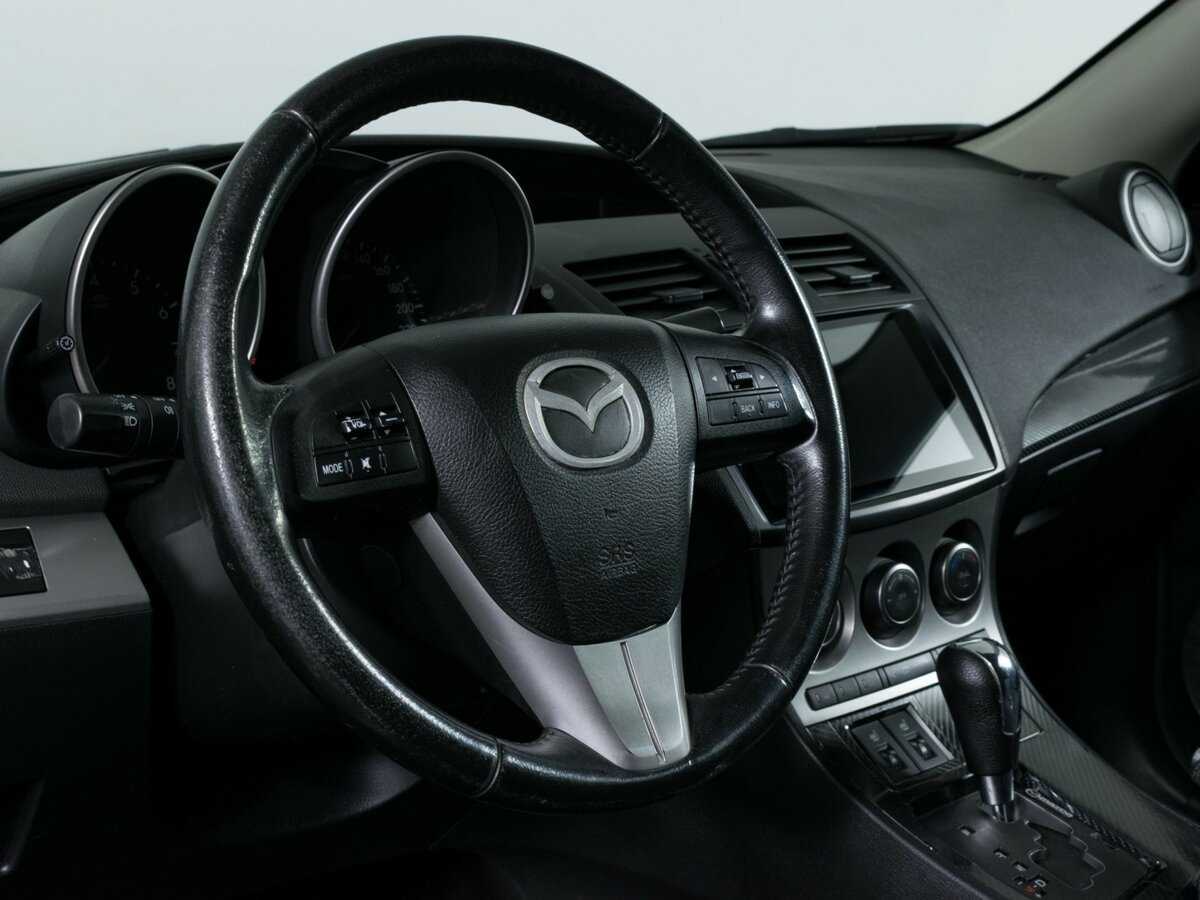 Mazda 3 с пробегом — 2010 год. Фото: #11