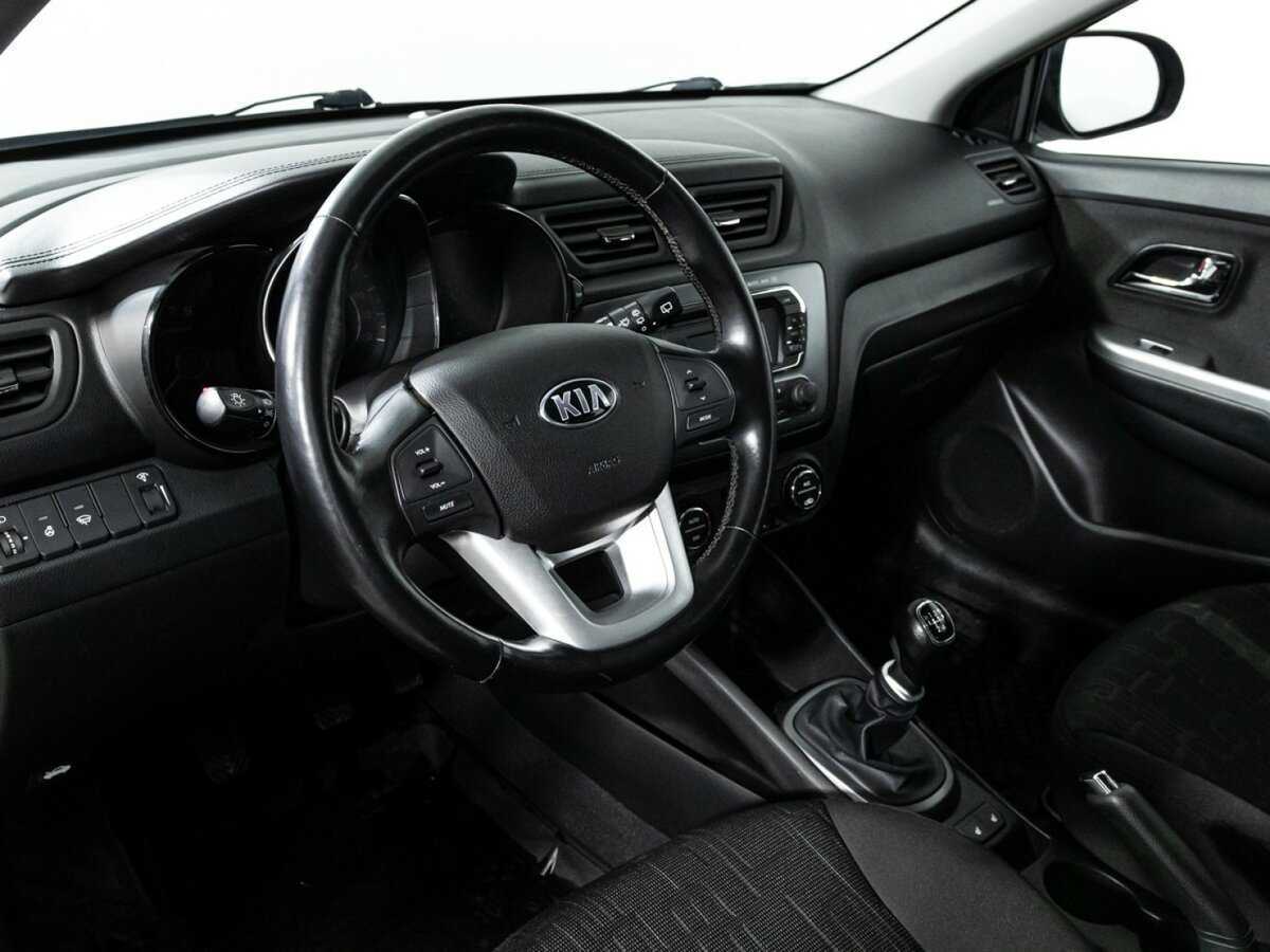 Kia Rio с пробегом — 2013 год. Фото: #10