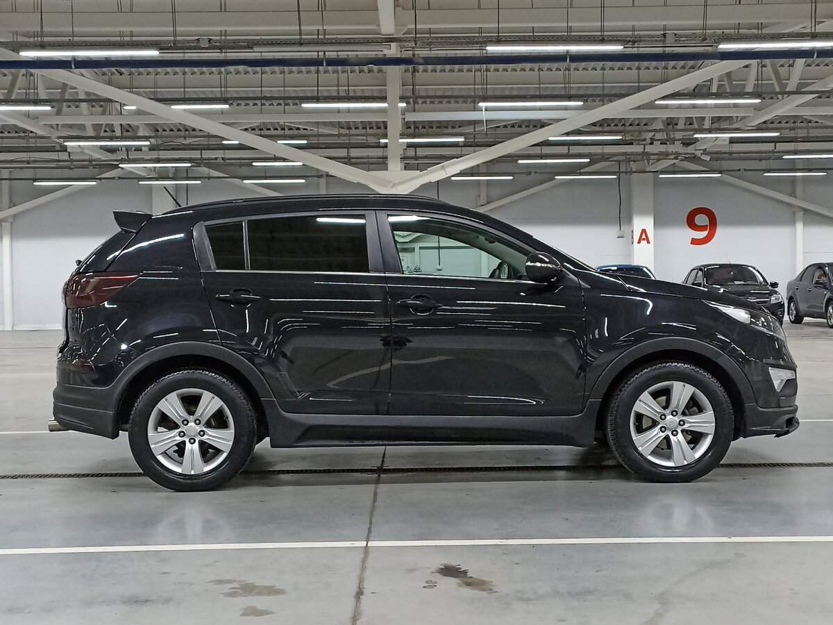 Kia Sportage с пробегом — 2011 год. Фото: #3