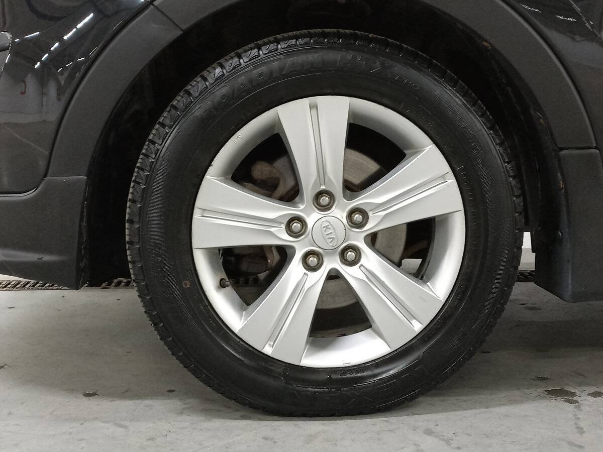 Kia Sportage с пробегом — 2011 год. Фото: #17