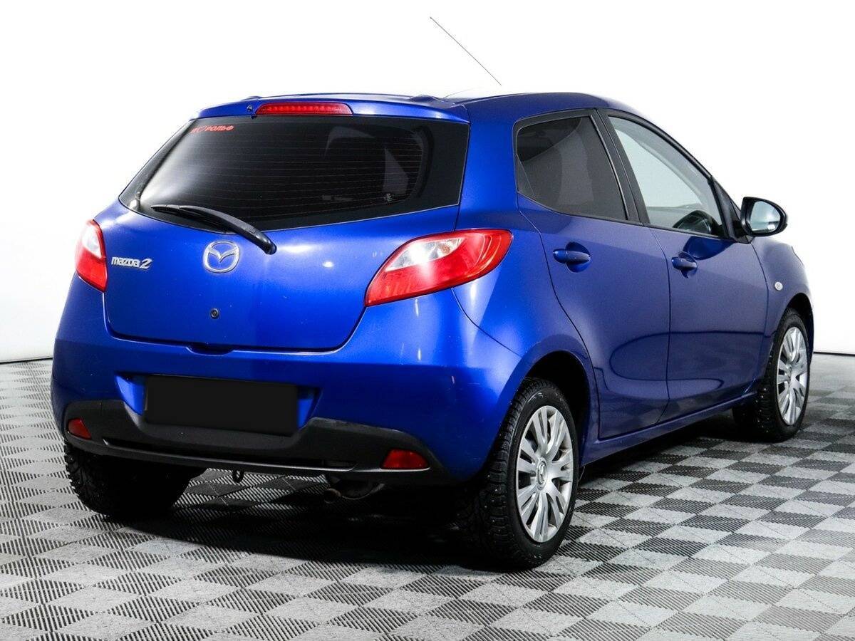 Mazda 2 с пробегом — 2008 год. Фото: #4