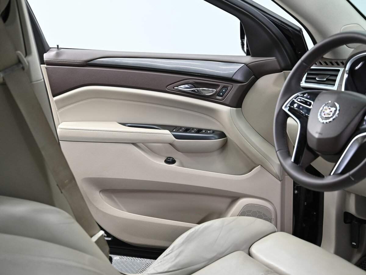 Cadillac SRX с пробегом — 2013 год. Фото: #4