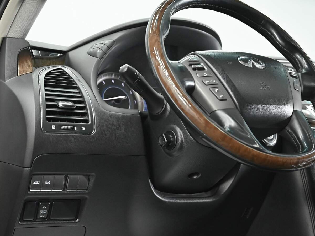 Infiniti QX80 с пробегом — 2013 год. Фото: #7