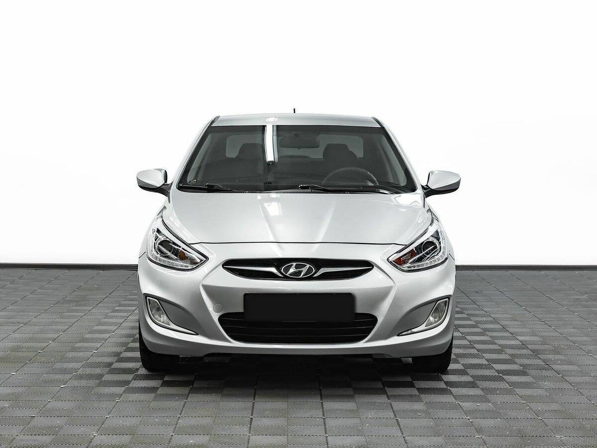 Hyundai Solaris с пробегом — 2011 год. Фото: #1