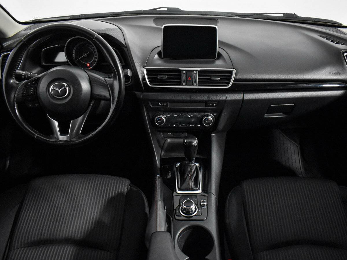 Mazda 3 с пробегом — 2014 год. Фото: #11