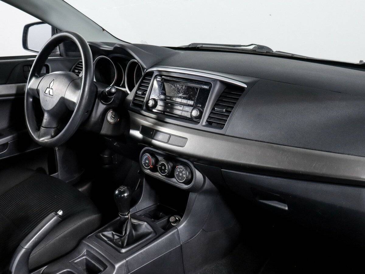 Mitsubishi Lancer с пробегом — 2014 год. Фото: #7