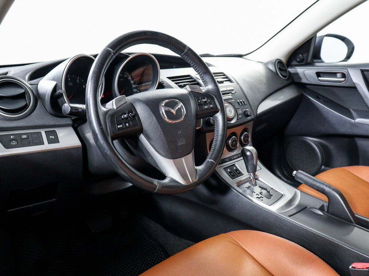 Mazda 3 с пробегом — 2011 год. Фото: #12