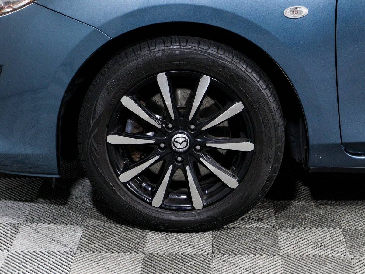 Mazda 3 с пробегом — 2011 год. Фото: #13