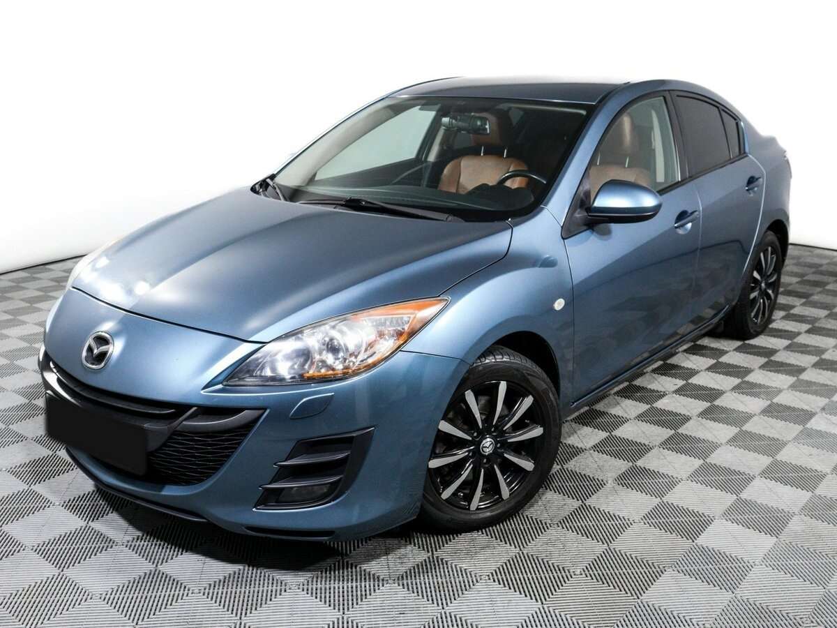 Mazda 3 с пробегом — 2011 год. Фото: #14