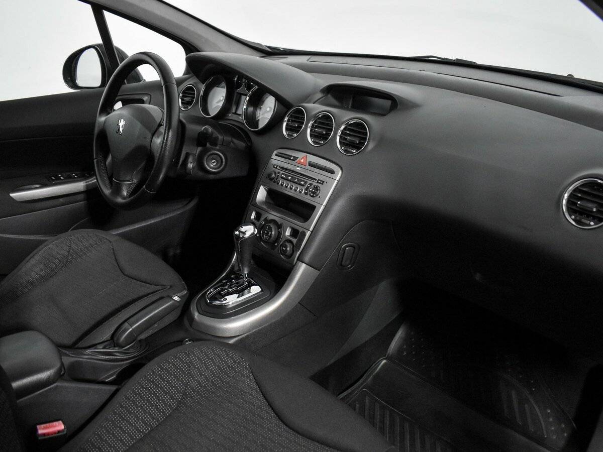 Peugeot 308 с пробегом — 2009 год. Фото: #9