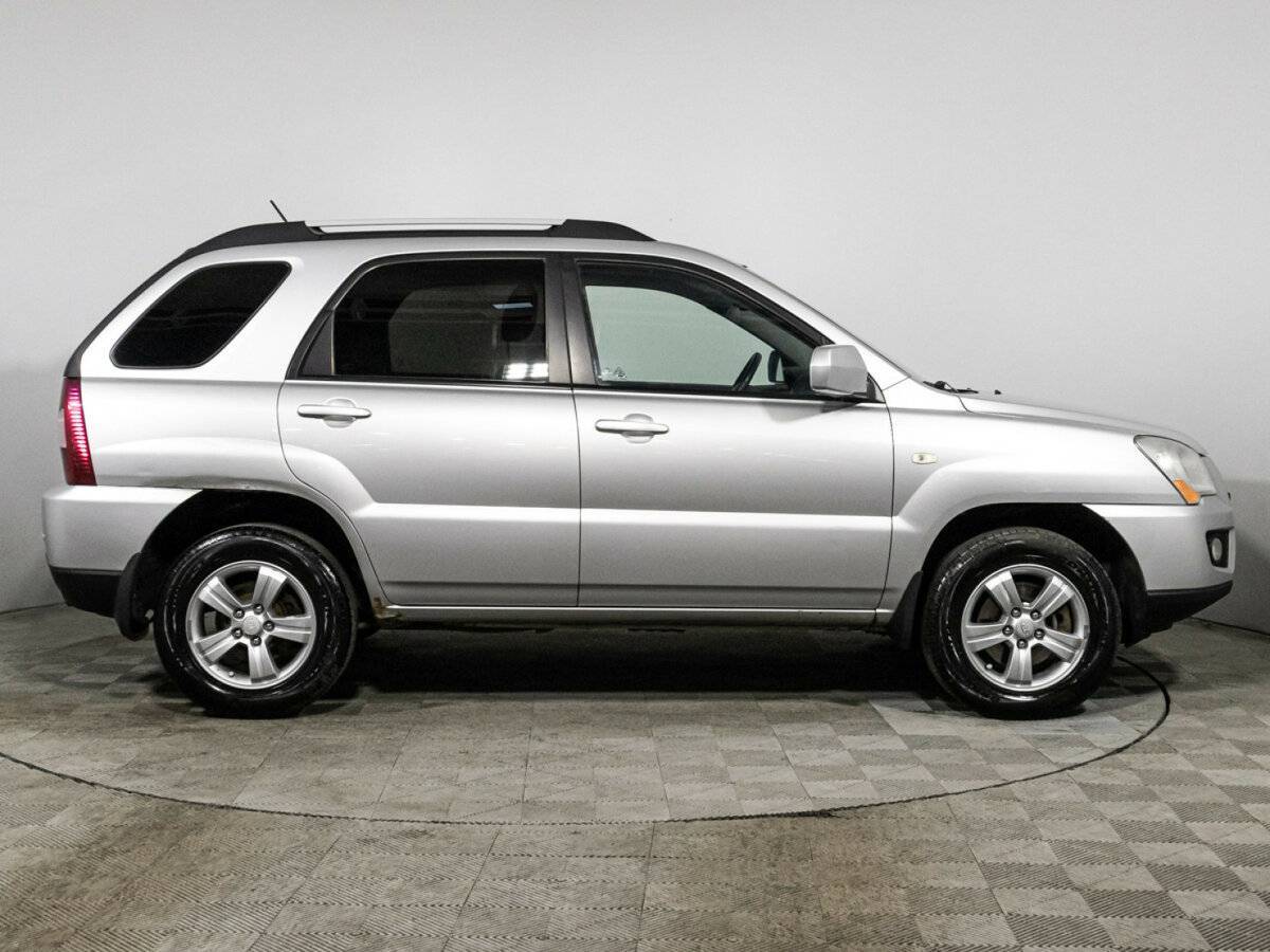 Kia Sportage с пробегом — 2010 год. Фото: #3
