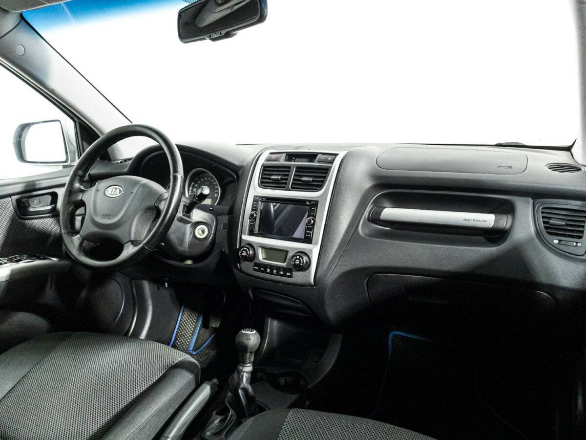 Kia Sportage с пробегом — 2010 год. Фото: #8