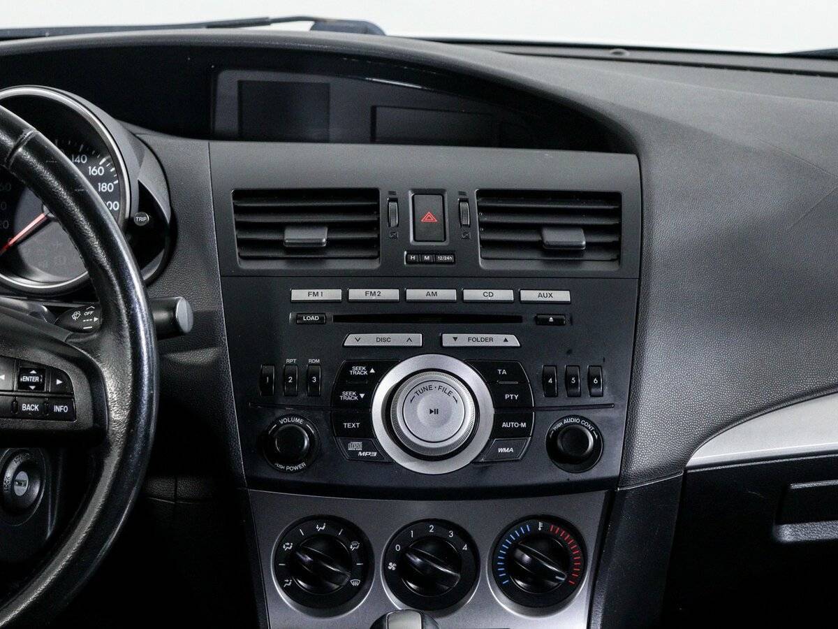 Mazda 3 с пробегом — 2011 год. Фото: #12