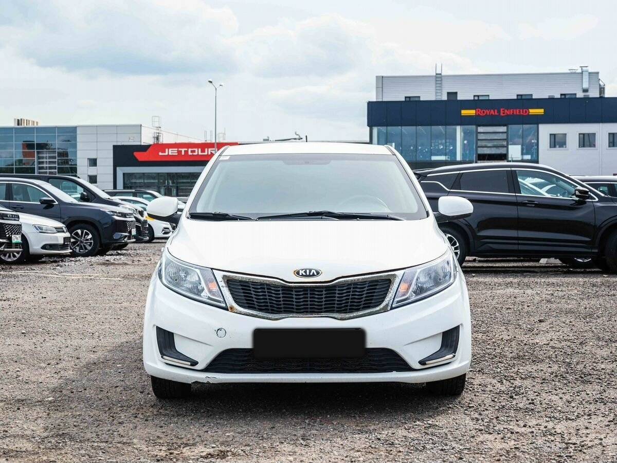 Kia Rio с пробегом — 2014 год. Фото: #1