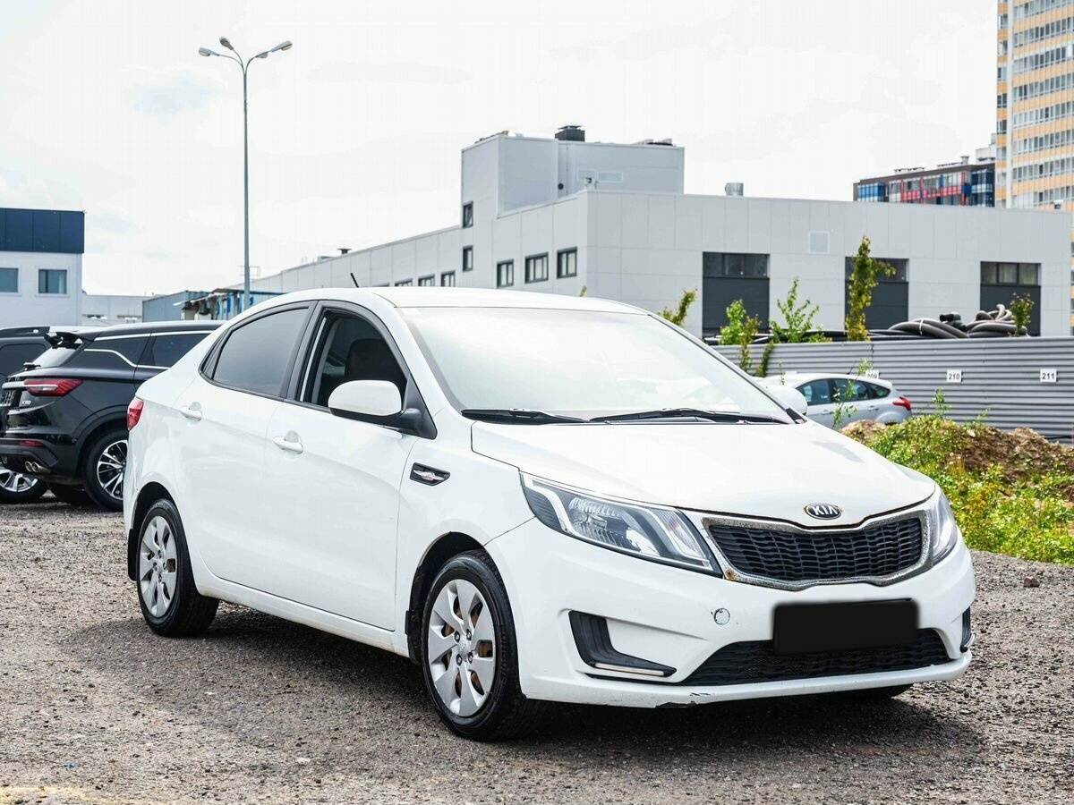 Kia Rio с пробегом — 2014 год. Фото: #2