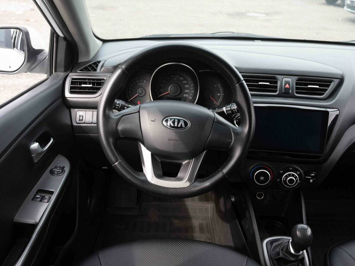 Kia Rio с пробегом — 2014 год. Фото: #13