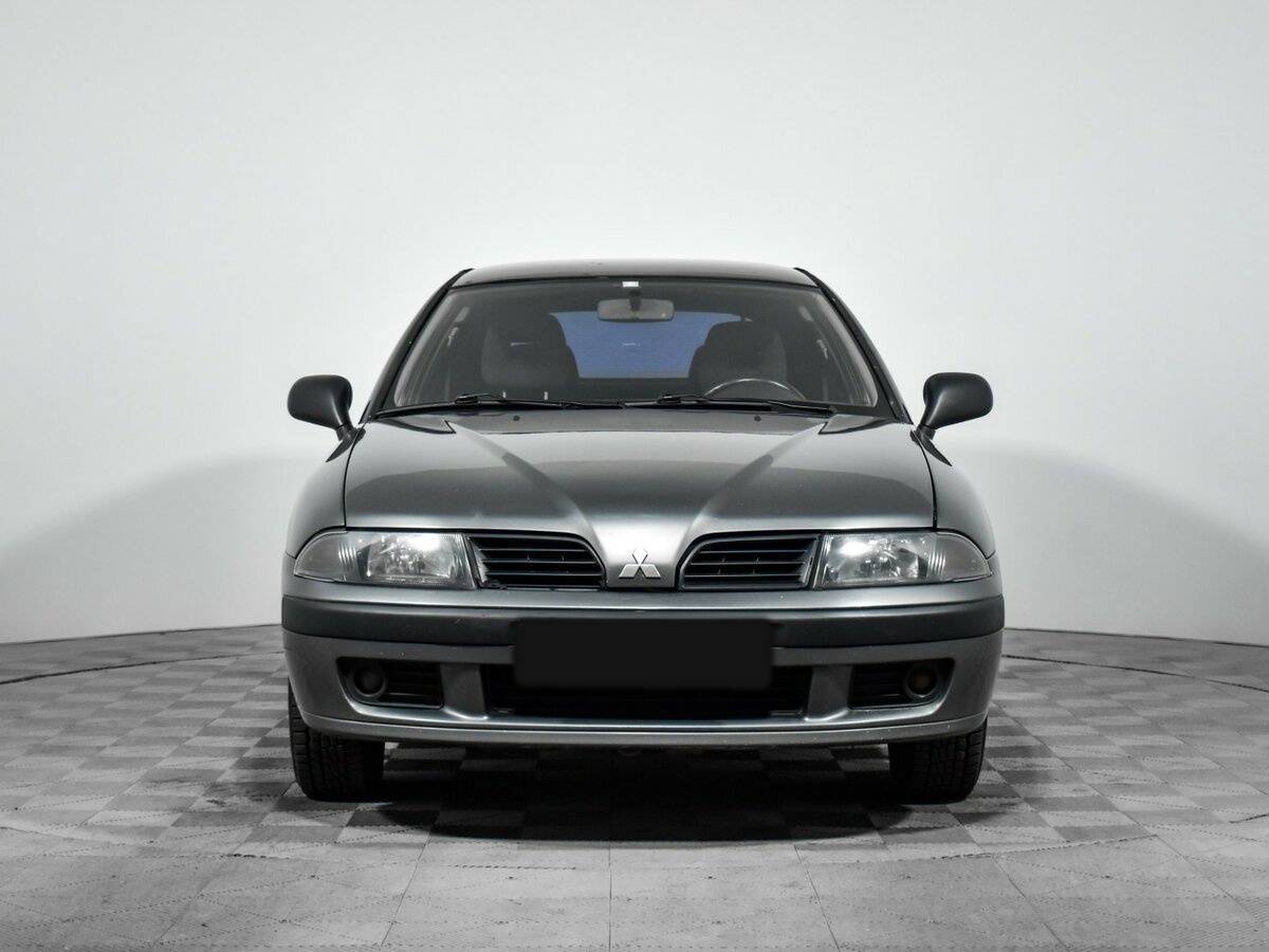 Mitsubishi Carisma с пробегом — 2003 год. Фото: #1