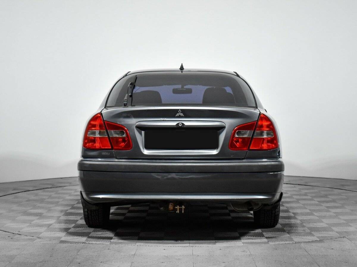 Mitsubishi Carisma с пробегом — 2003 год. Фото: #5