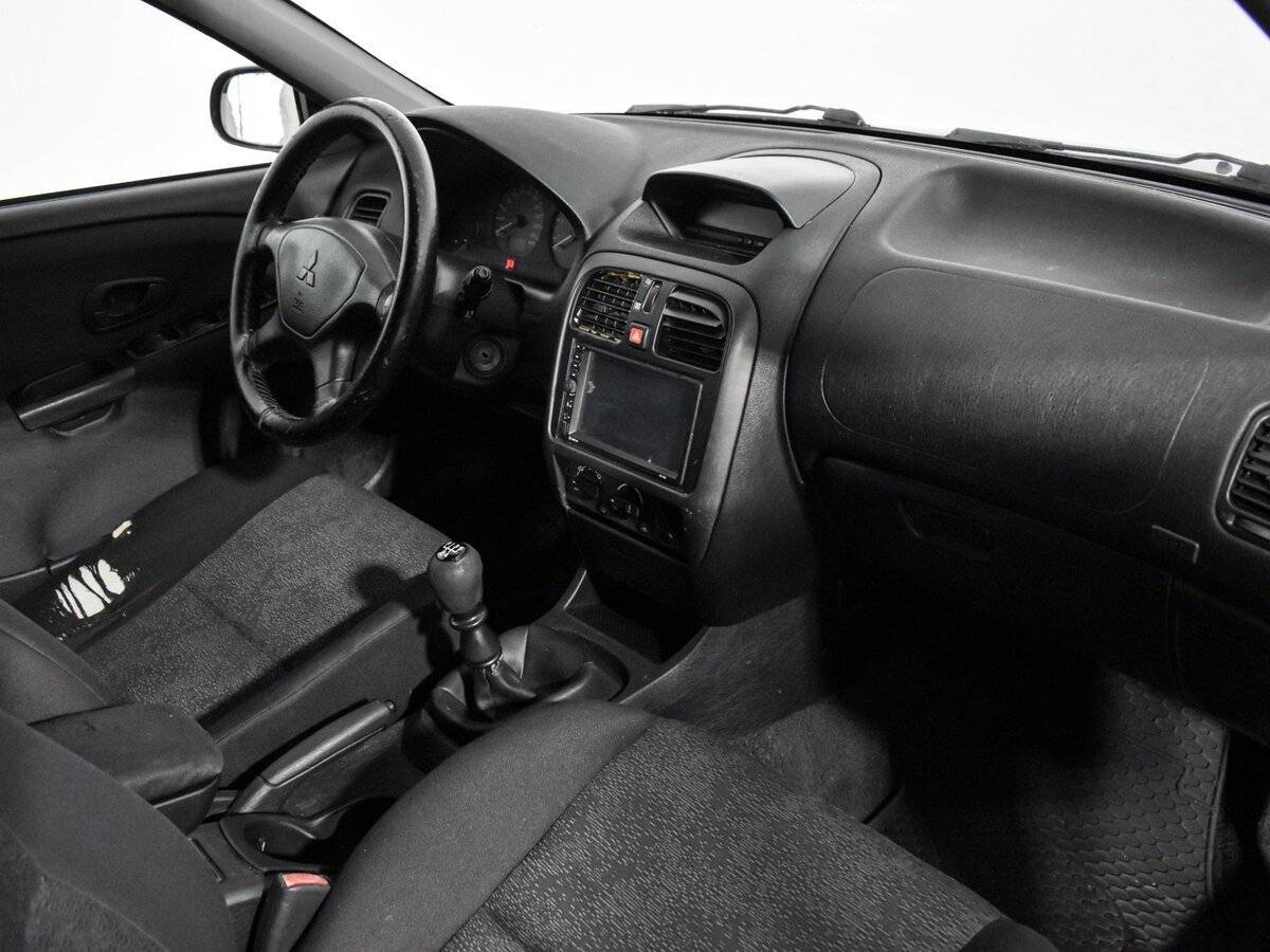 Mitsubishi Carisma с пробегом — 2003 год. Фото: #10