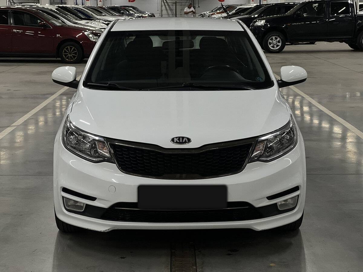 Kia Rio с пробегом — 2015 год. Фото: #1