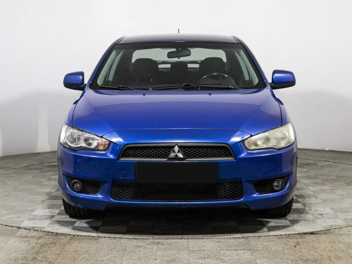 Mitsubishi Lancer с пробегом — 2010 год. Фото: #1